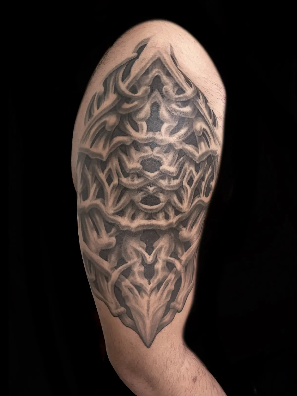 Ornamental bio-organic shoulder piece