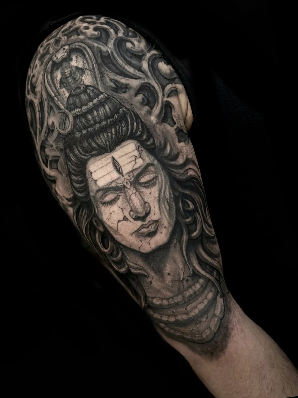 Black and grey realism half sleeve of Lord Shiva